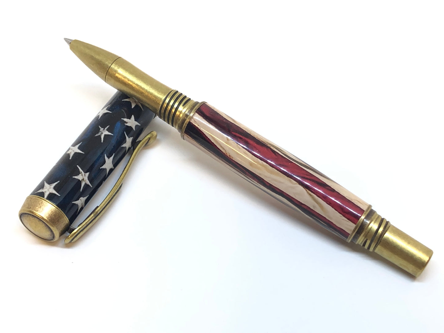 George Rollerball / Antique Brass - Resin / American Flag Clear Cast