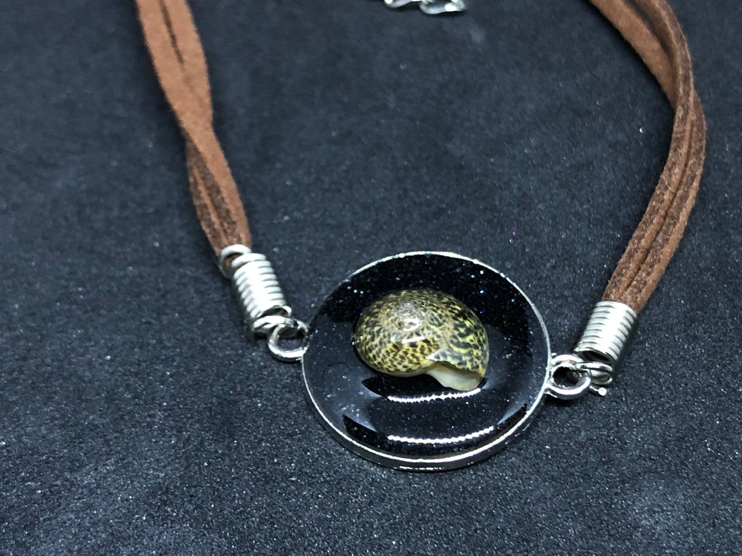 Seashell w/ Black Sand / Silver Pendant - Brown Woven Leather Bracelet