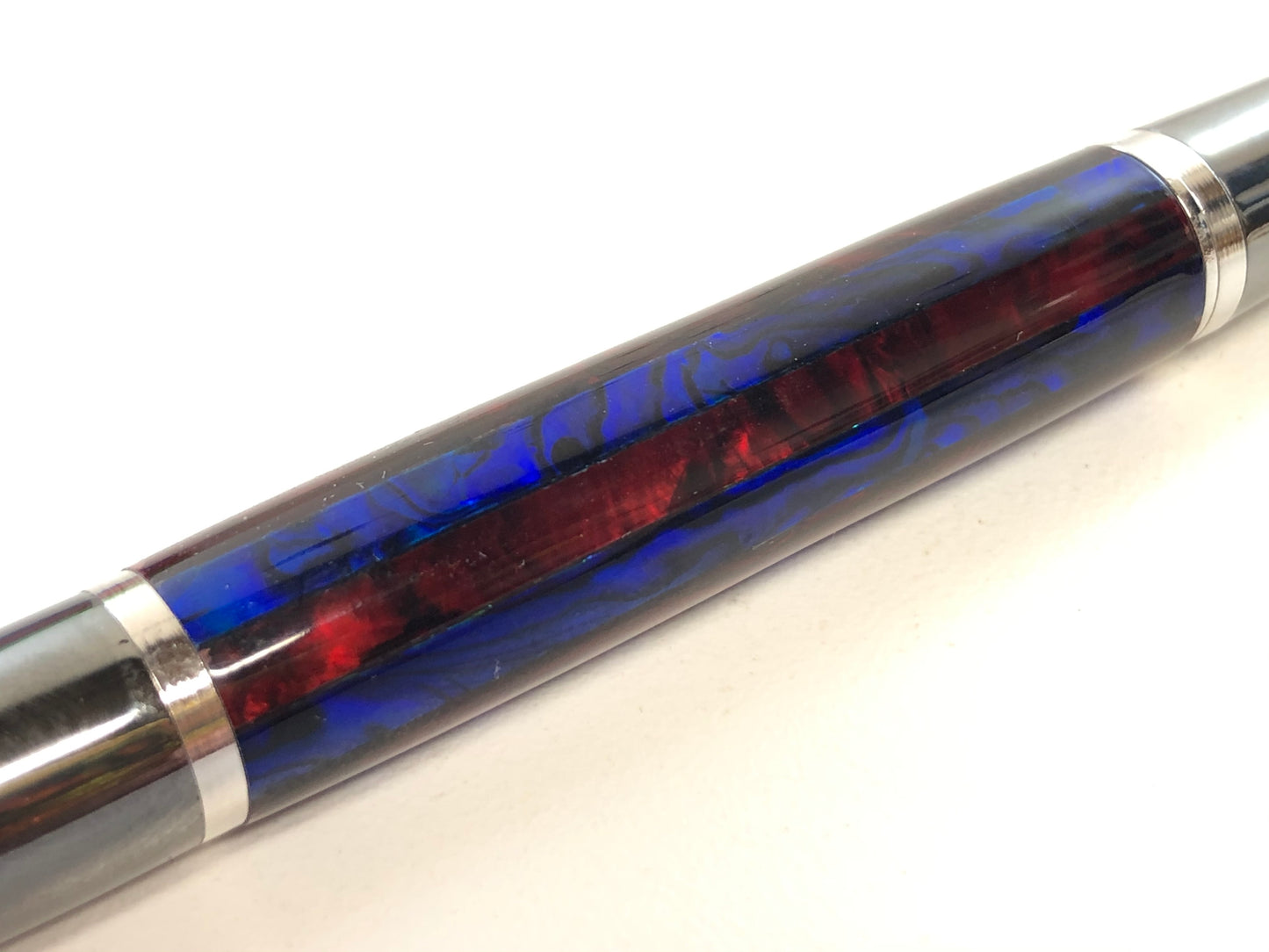 Ares / Black Titanium and Rhodium - Blue and Red Paua Abalone