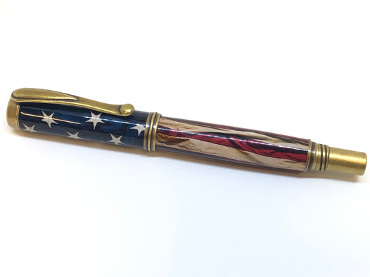 George Rollerball / Antique Brass - Resin / American Flag Clear Cast