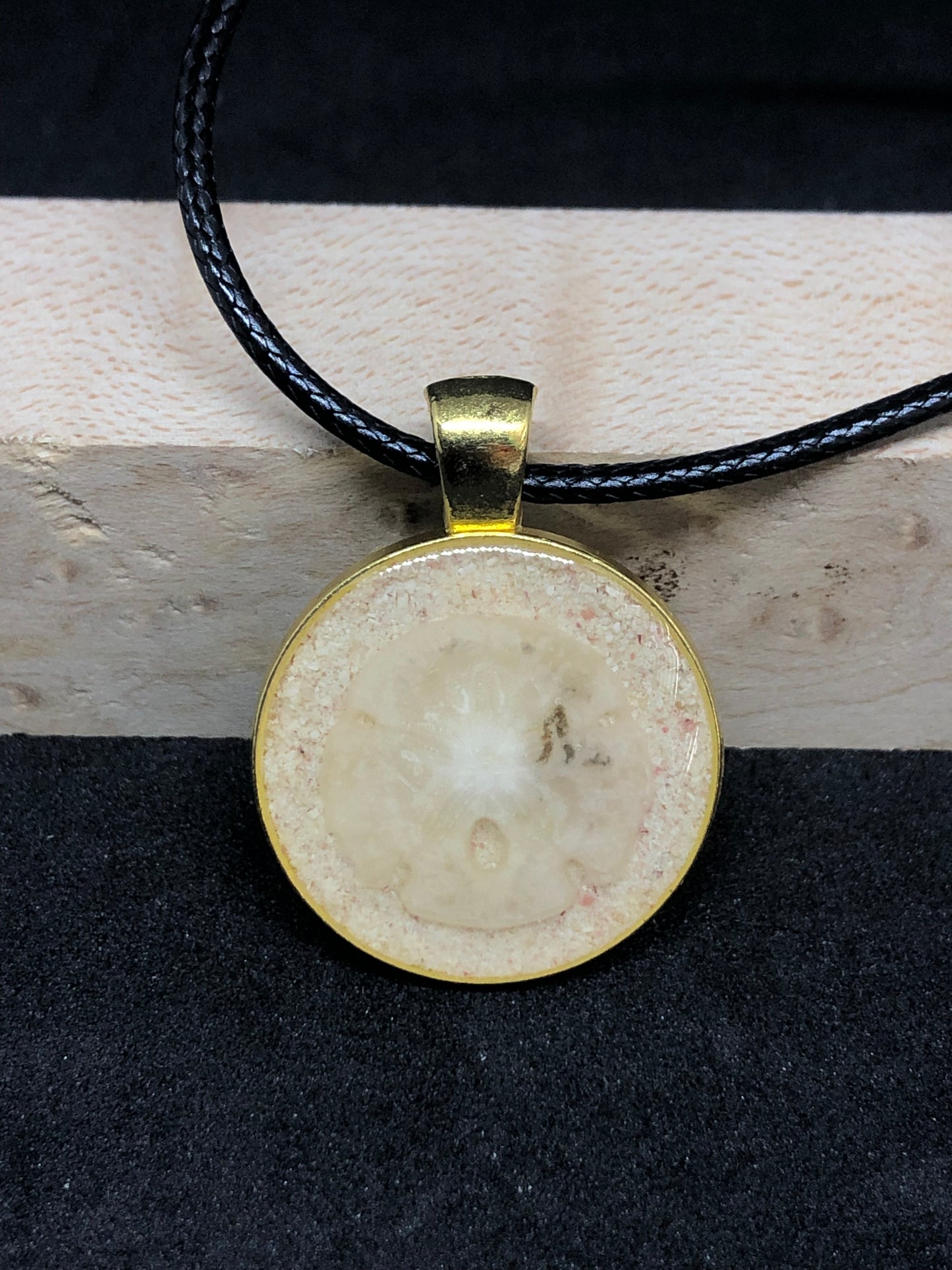 Sand Dollar w/ Pink Sand / Gold Pendant - Black Cord Necklace